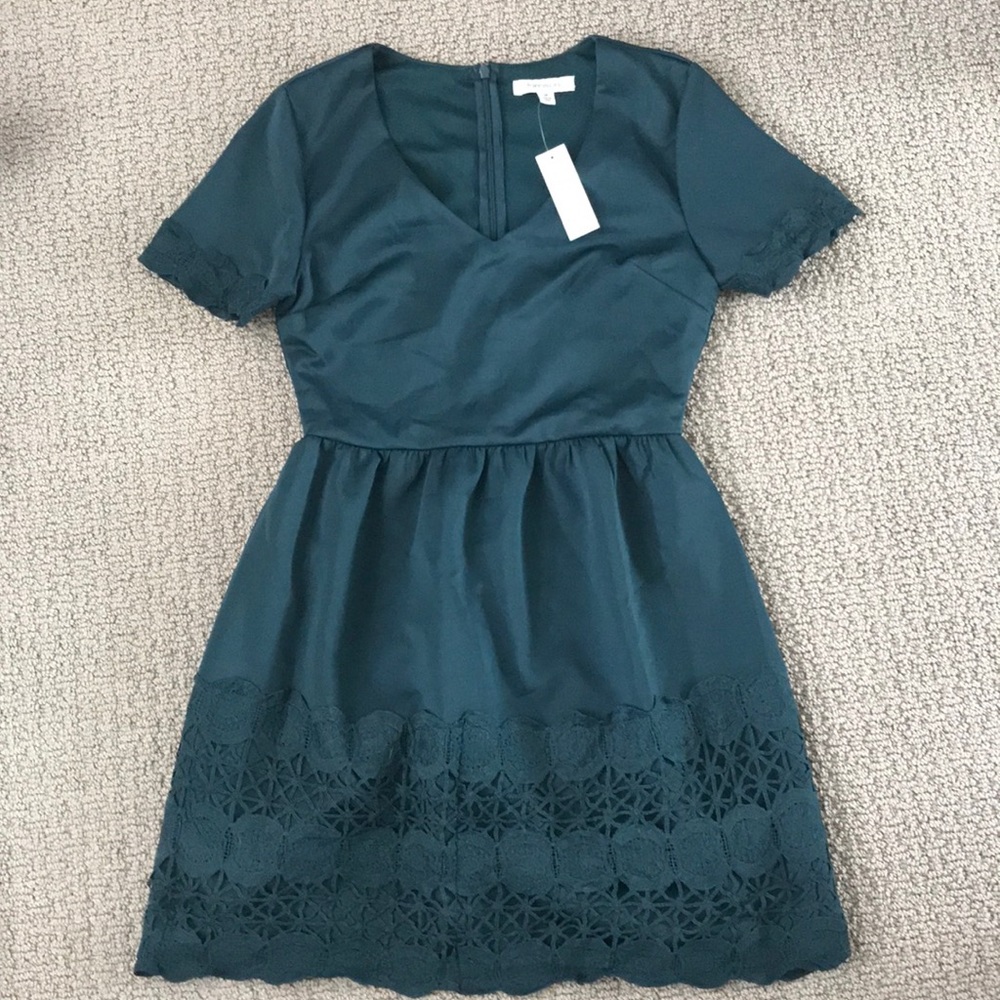 Francesca’s forest green dress